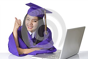 Graduate student sitting with computer