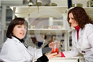 Graduate students in the lab with teacher