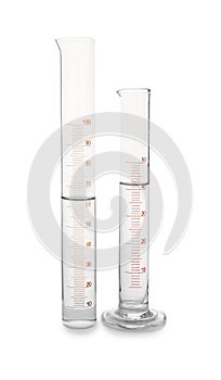 Graduated cylinders with water on white background