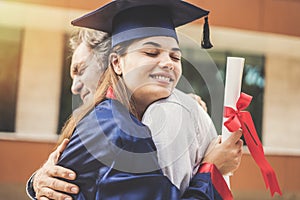 Graduated student hugging her father