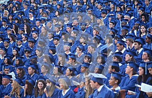 Graduating students in cap and gowns