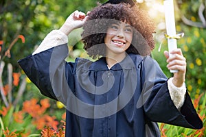 Graduation, achievement and woman student or graduate celebrate success on university or college campus. Happy
