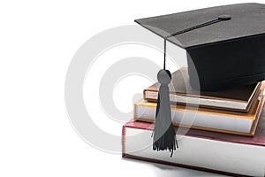 Graduation cap and book