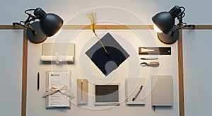 Graduation Cap and Diploma Display with Study Materials