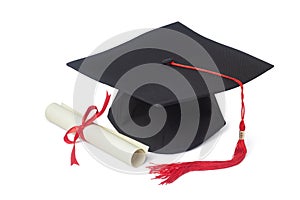 graduation cap and diploma photo