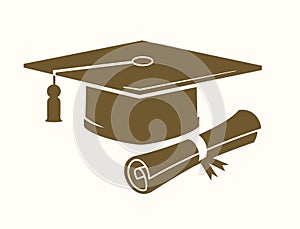 Graduation cap and diploma photo