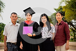 Graduation ceremony. Parents and family congratulate the student, who finish their studies at the university