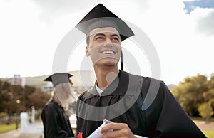 Graduation, happy man and thinking of success, achievement and study goals at outdoor college event. Graduate, education