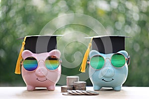 Graduation hat on piggy and stack of coins money on natural green background, Saving money for education concept