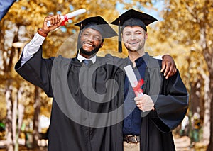 Graduation portrait, friends and students on university or college campus, success and celebration of diploma. Happy men