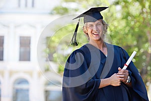 Graduation, portrait and happy man on campus with certificate, smile and success with university education. School