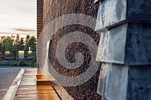 Graduation tower in Jaworzno, Silesia, Poland in the evening light. Beautiful, modern construction made of wood and blackthorn