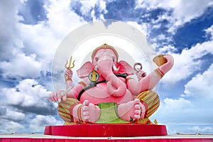 Graet pink Ganesha image is stituated outdoor and cloudy sky of Magha puja Buddha Park Memorial in Garden Buddha