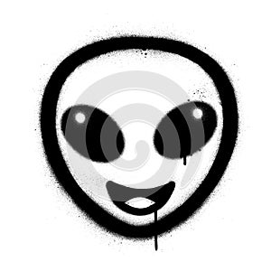 Graffiti alien sprayed in black over white