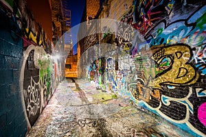 Graffiti Alley at night, in the Station North District, of Baltimore, Maryland.