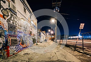 Graffiti Alley at night, in the Station North District, of Baltimore, Maryland.