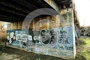 Graffiti under train bridge in Lathrop