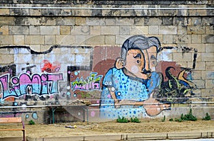 Gaffiti at a wall at danube canal in Vienna