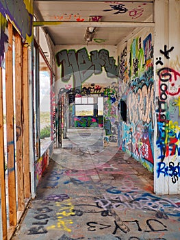 Graffiti Covers the Remains of an Abandoned Gas Station along old Route 66