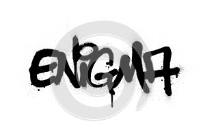 Graffiti enigma word sprayed in black over white photo