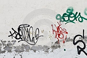 Graffiti on grunge wall photo