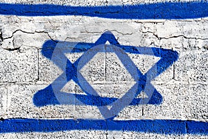 Graffiti with israeli flag on a wall