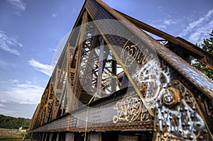 Graffiti On Old Rusty Train Bridge
