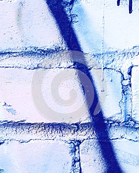 Graffiti painted on a brick wall texture