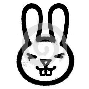 Graffiti smiling rabbit sprayed in black over white