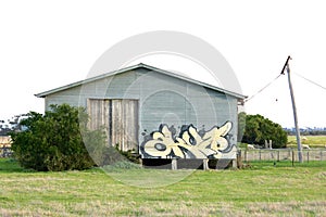 Graffiti tag on country shed