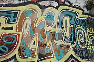 Graffiti text on a concrete wall