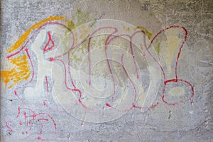 Graffiti on a wall with the word Run