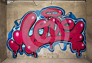Graffiti of word love on a wall