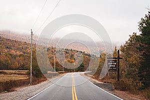 Grafton Notch State Park sign and autumn color in Maine