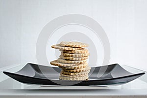 Homemade cookies on black plate photo