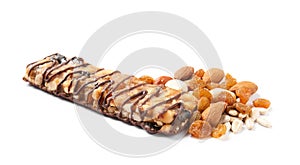 Grain cereal bar with chocolate, nuts and raisins