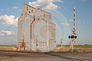 Grain Elevator near Railroad Crossing