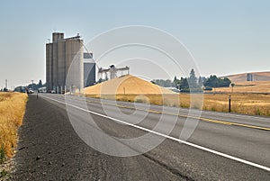 Grain Elevator and Wheat Pile photo