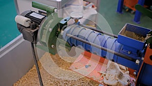 Grain mill machine - feed production line at trade show - close up