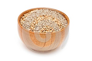 Grain wheat in wooden bowl
