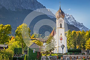 Grainau Church at golden autumn and Zugspitze, Garmisch Partenkirchen, Germany