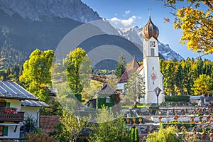 Grainau Church at golden autumn and Zugspitze, Garmisch Partenkirchen, Germany