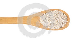 Grains over wooden bamboo spoon. Isolated, White background.