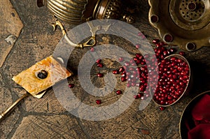 Grains of pomegranate on old paving stones