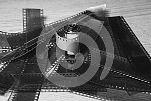 Grainy image of a roll of film on film negatives