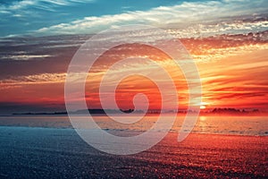 Grainy soft gradient abstract background in red orange blue