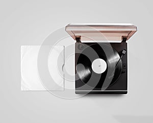 Gramophone vinyl player and record cover sleeve mockup, top view photo