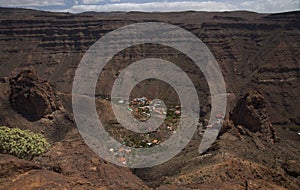 Gran Canaria, landscape of the southern part of the island along Barranco de ArguineguÃÂ­n steep and deep ravine photo