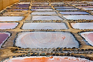 Gran Canaria, Salinas de Tenefe salt evaporation ponds, southeastern part of the island, pink color created by Dunaliella salina
