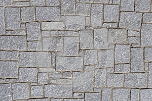 Gran pared o muro de bloques de granito photo